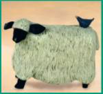 WW2480 Sheep with a blue bird riding on its back
