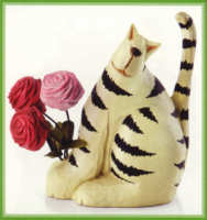WW7673 A white and black striped cat holds three roses